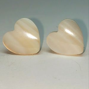 Mother of Pearl post and clutch back earrings.